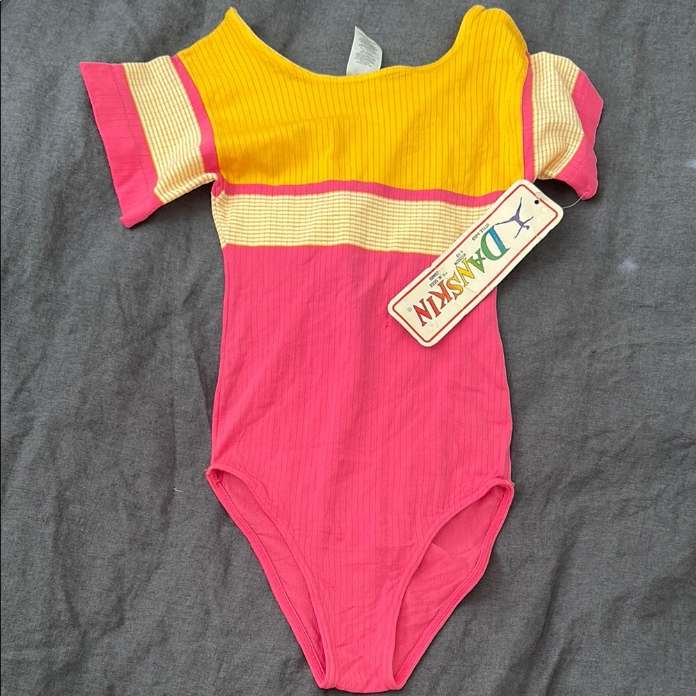 Vintage danskin 1980s child’s medium nylon leotard tags still attached